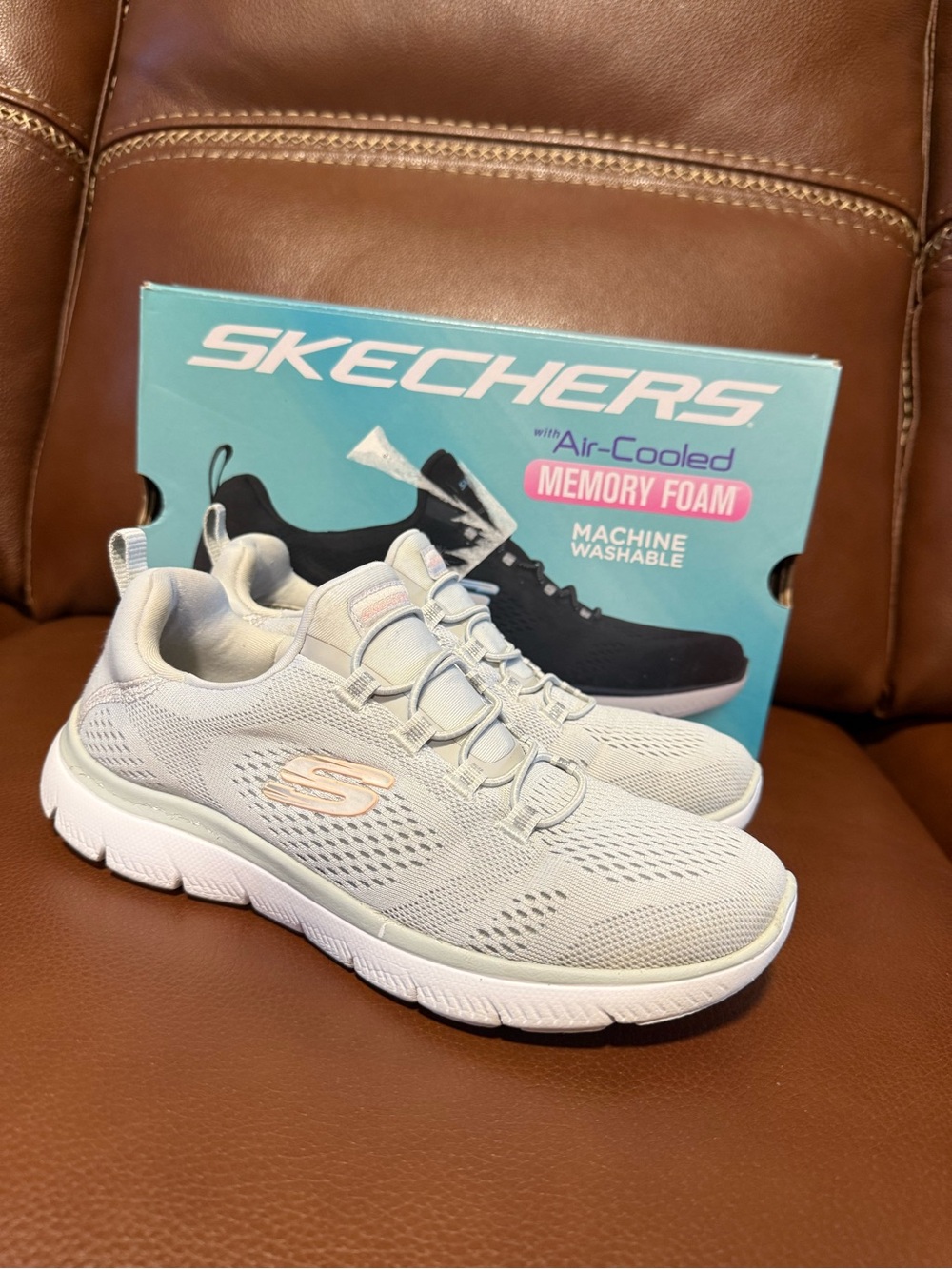 Skechers Women’s Light Gray Slip-On Athletic Sneakers with Subtle Pink Logo